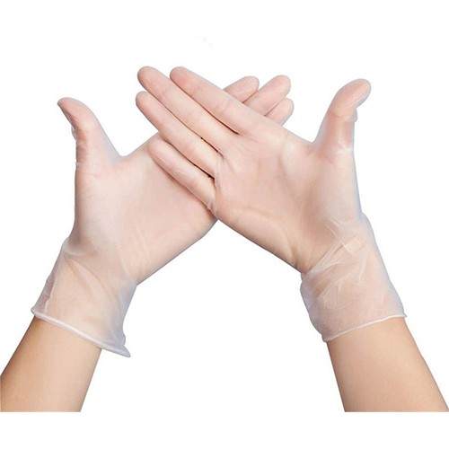 vue de mains portant des gants en vinyle