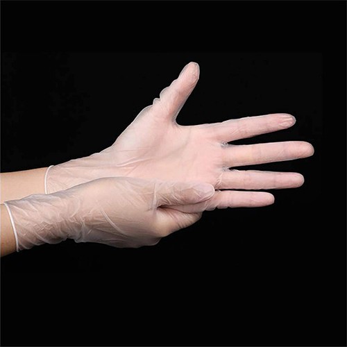 vue de mains portant des gants vinyles